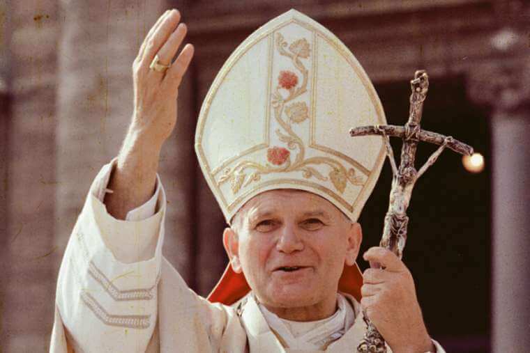 Pope St. John Paul II in St. Peter's Square Pope Pius XI continued the application of Catholic social teaching to issues like socialism.